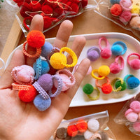 Lot de 20 chouchous à pompons en peluche